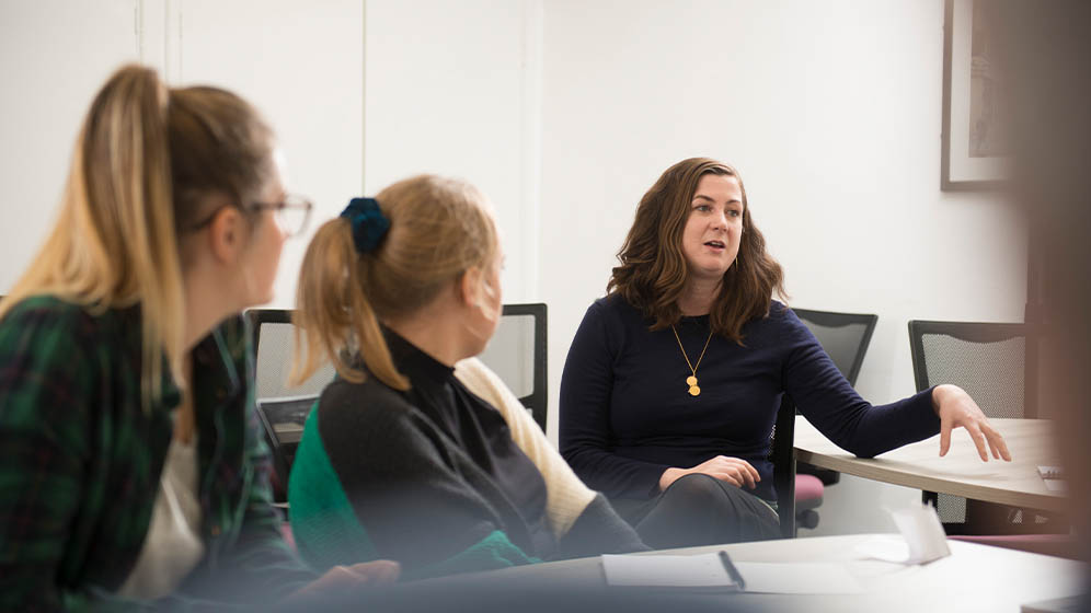 Students have a discussion during a seminar